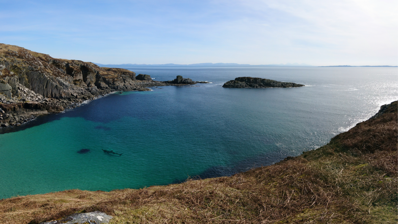 Coastal view across the sea from the top of a cliff in the UK